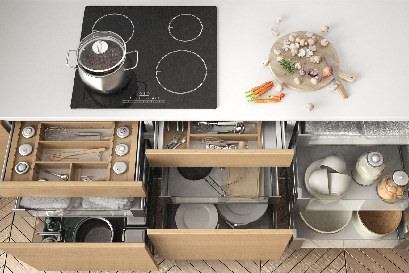 Home organization in the kitchen: organized drawers with utensil dividers, neatly arranged cookware, and a tidy stovetop with a kettle and vase of flowers.